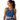 Cobalt Oasis Athletic Crop Top by Hadley Pollet with teal, white and amber flowers on blue, worn by a model in a studio