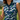 Close-up of the Green Wave Zinnia Golf Sleeveless Top by Hadley Pollet, navy waves, green zinnias, striped collar