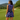 Back view of the Purple Wave Zinnia Golf Sleeveless Top by Hadley Pollet with matching skirt on a golf course