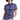 Purple Wave Zinnia Tennis Polo by Hadley Pollet, lavender and navy wave print with green zinnias, worn by a model in a studio