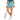 Teal Wave Zinnia Tennis Skirt by Hadley Pollet with pink zinnias, worn by a model holding a racket in a studio, front view